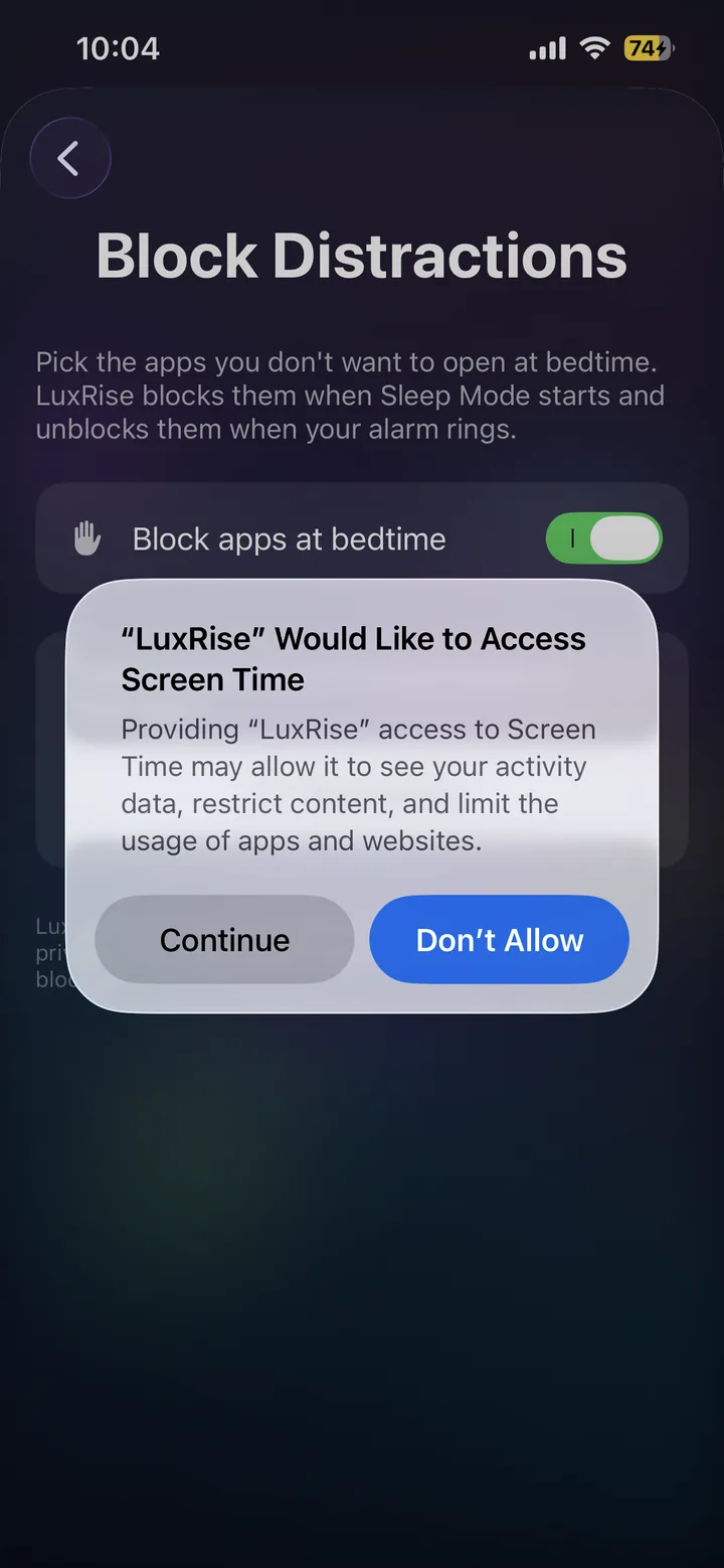The iOS Screen Time permission prompt asking to allow LuxRise access