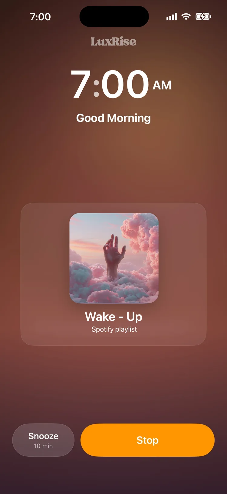 LuxRise wake screen at 7:00 AM playing a Spotify playlist over a sunrise glow